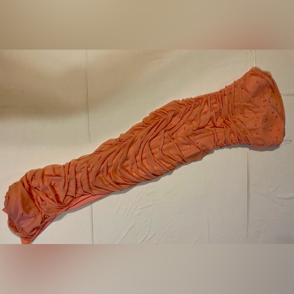 Strapless Coral Ruched Evening Gown with Beaded Accents